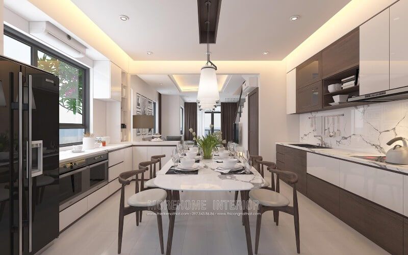Tủ bếp gỗ công nghiệp tạo cảm giác sáng sủa, tươi mới và trung tính. Màu trắng chủ đạo giúp tăng cường ánh sáng tự nhiên và làm cho mọi thứ có cảm giác sạch sẽ