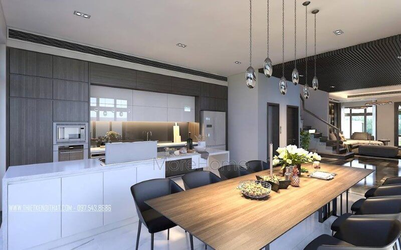 Sắp xếp nội thất phòng ăn liền bếp hiện đại, đẹp từ tủ bếp đảo kết hợp đá ốp cao cấp cùng bộ bàn ghế ăn gỗ nguyên tấm độc đáo.